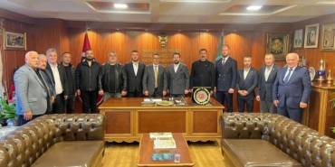 MHP-Yenisehir-heyeti-BESOBda-esnaf-sorunlarini-gorustu-featured
